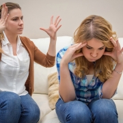 mother and daughter or two sisters arguing